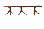 A REGENCY MAHOGANY TRIPLE PEDE