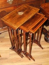 A Regency nest of rosewood qua