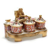A REGENCY PARCEL GILT PORCELAI