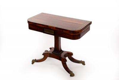 A Regency rosewood and brass inlaid