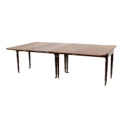 A REGENCY STYLE DINING TABLE,