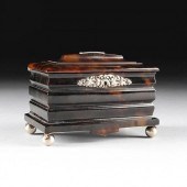 A REGENCY STYLE SILVERED METAL