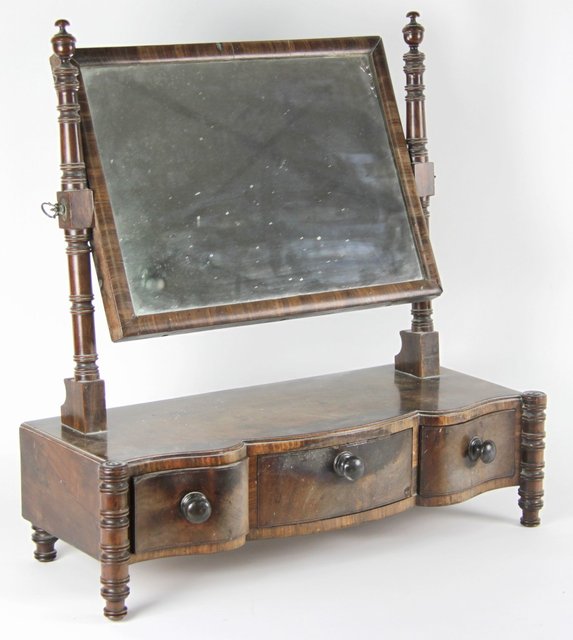 A Regency swing frame mirror the