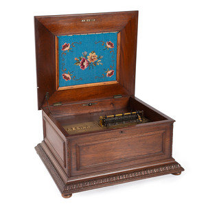 A Regina 15 1/2 Inch Disc Music Box
