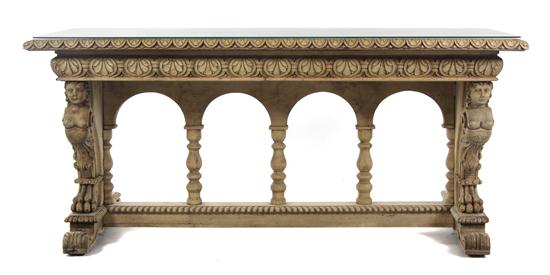 A Renaissance Revival Carved Pine