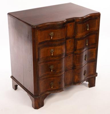 A reproduction chest of four long