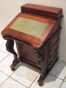 A reproduction mahogany Davenport