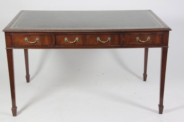 A reproduction mahogany writing