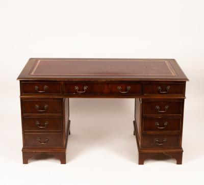 A reproduction pedestal desk, the