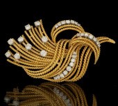 A Retro 18k Gold and Diamond B