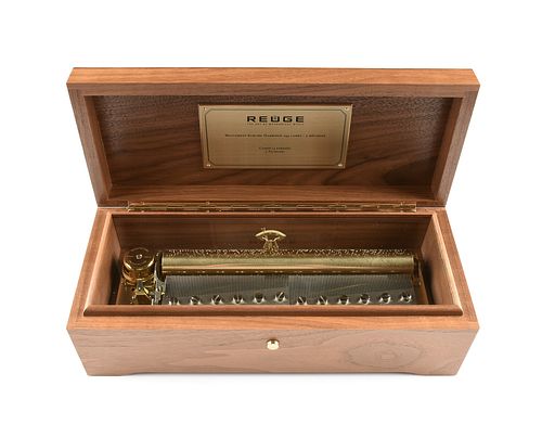 A REUGE WALNUT MUSIC BOX, "CANON IN