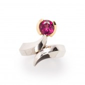 A RHODOLITE GARNET AND FOURTEE