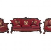 A Rococo Revival Carved Walnut
