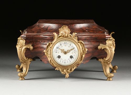 A ROCOCO REVIVAL GILT LACQUERED