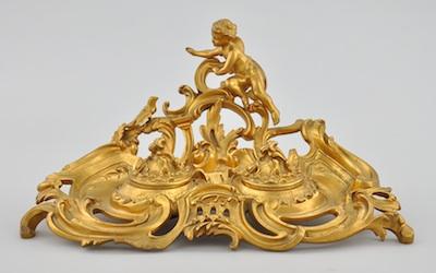 A Rococo Style Brightly Gilt