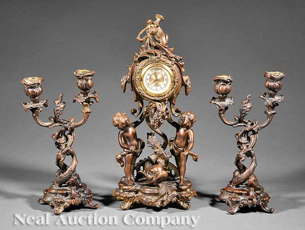 A Rococo-Style Bronze Three-Piece