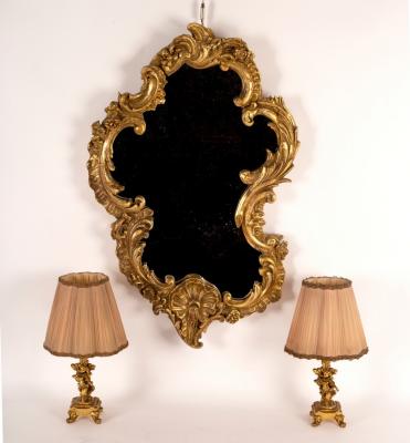 A Rococo style gilt framed