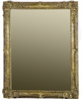 A ROCOCO STYLE GILTWOOD MIRROR