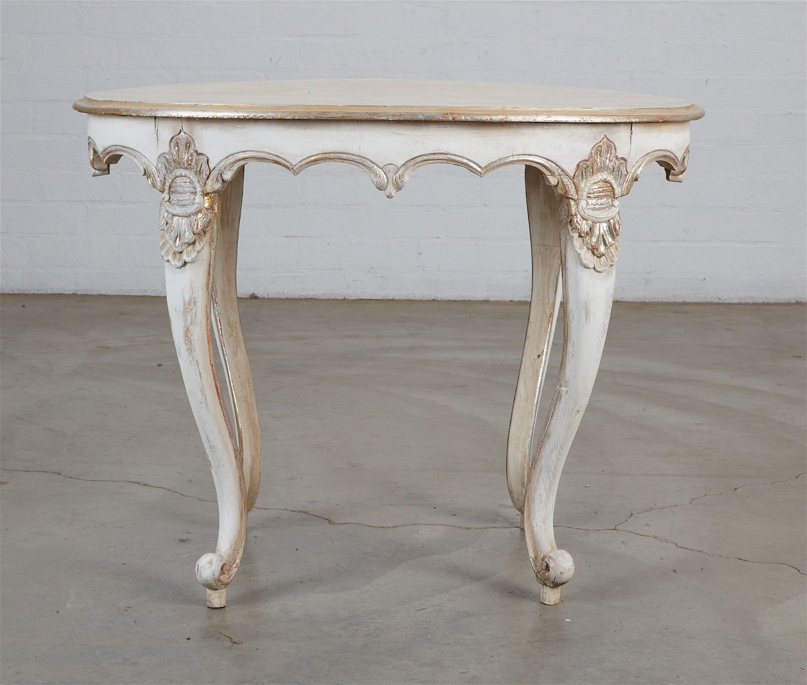 A ROCOCO STYLE PARCEL SILVERED