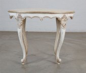 A ROCOCO STYLE PARCEL SILVERED