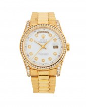 A ROLEX GOLD WRISTWATCH, PRESI