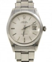 A ROLEX STAINLESS STEEL WRISTW