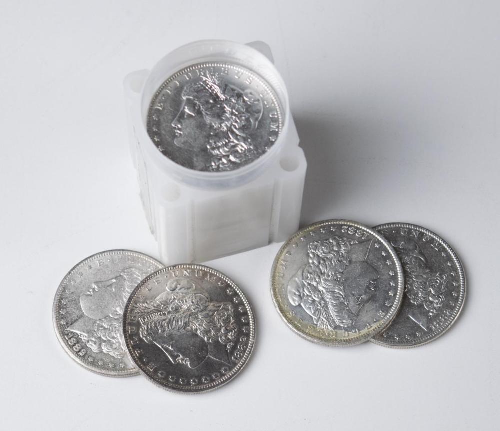 A ROLL OF TWENTY U.S. SILVER MORGAN