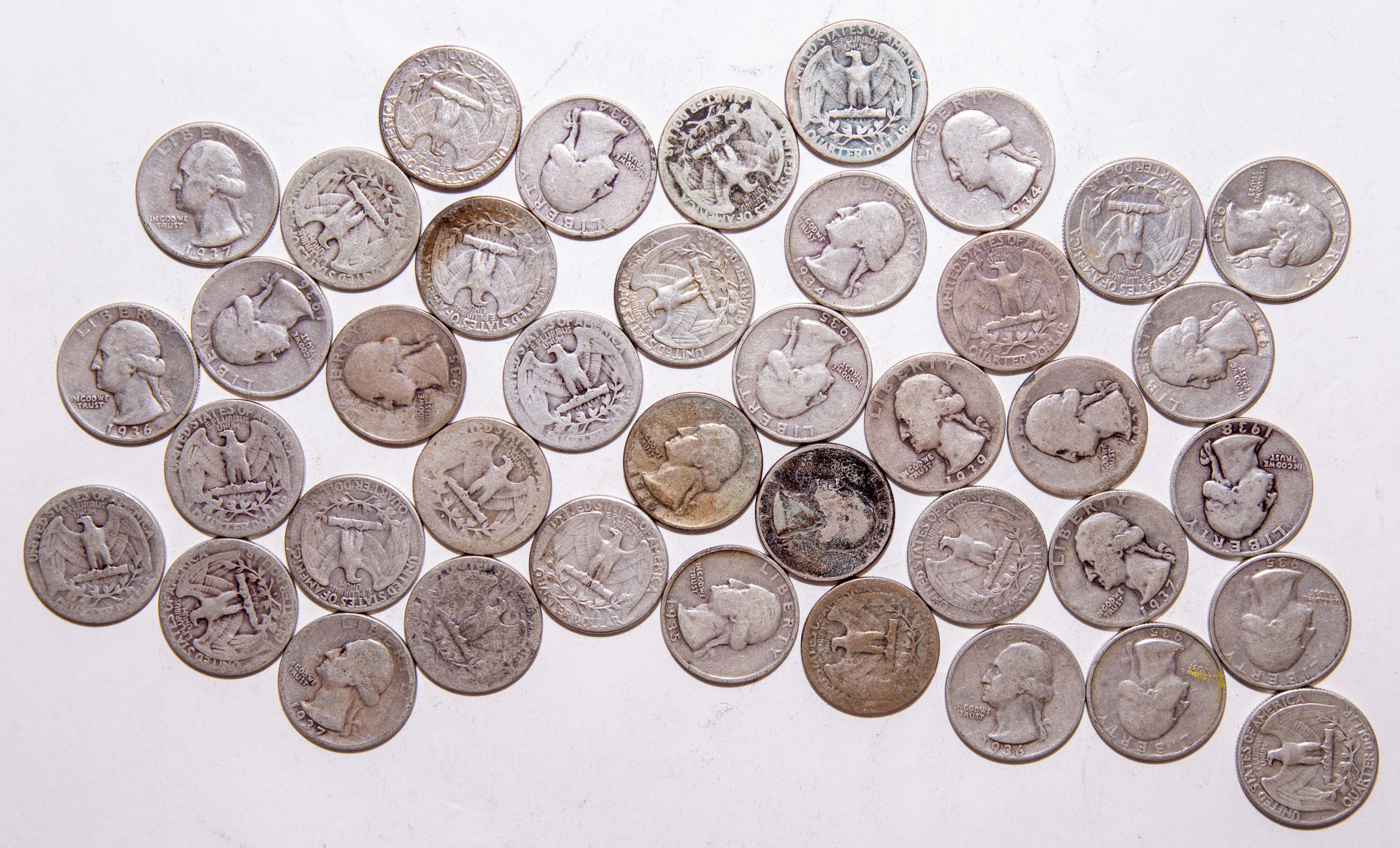 A ROLL OF WASHINGTON QUARTERS