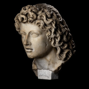 A Roman Marble Head of a Triton