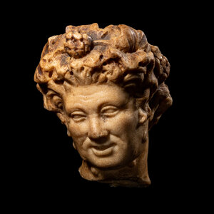 A Roman Marble Head of a Satyr