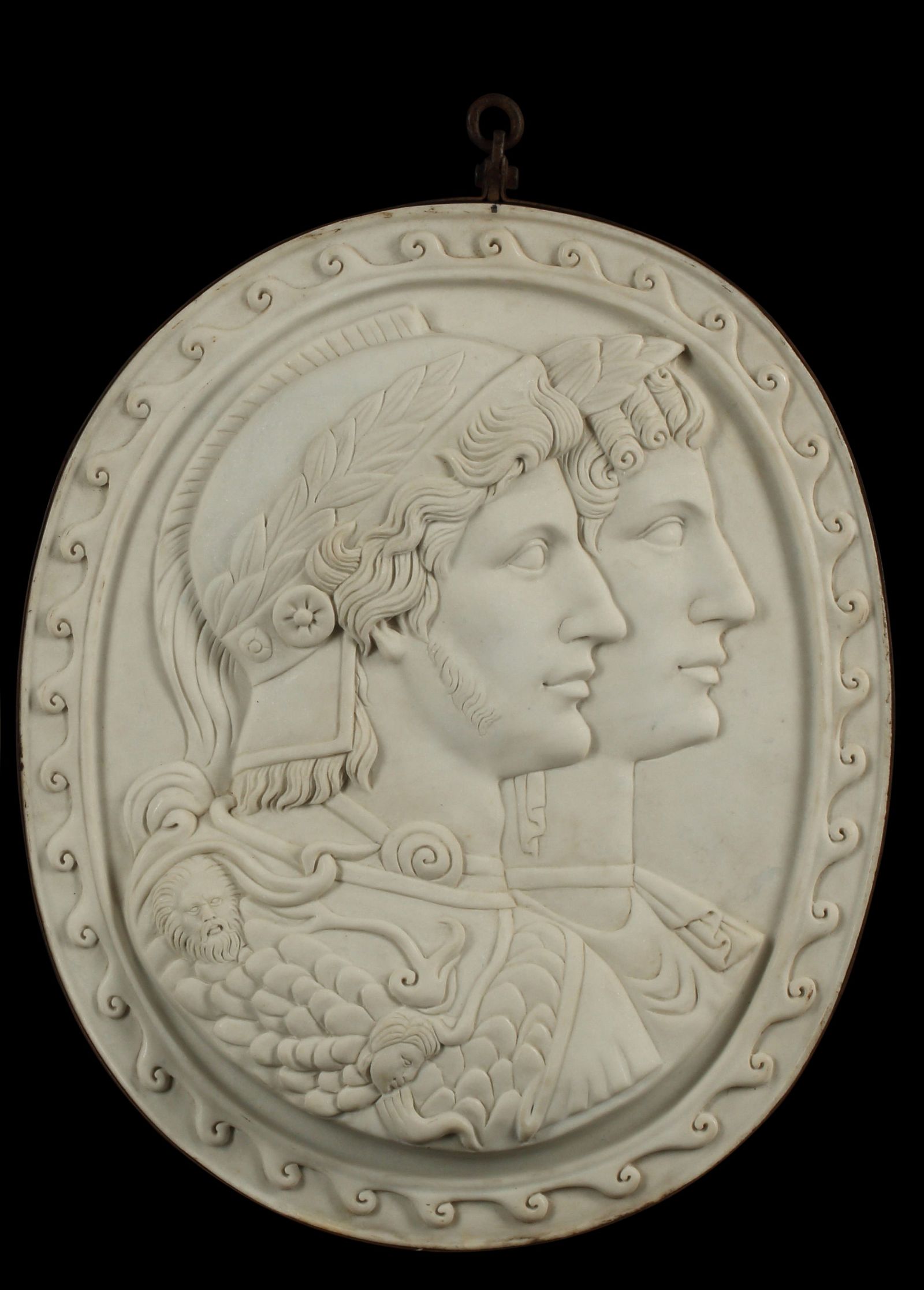 A ROMAN STYLE CARVED MARBLE