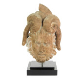 A ROMAN TERRACOTTA HEAD OF A S