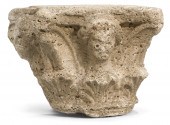 A Romanesque carved stone capi