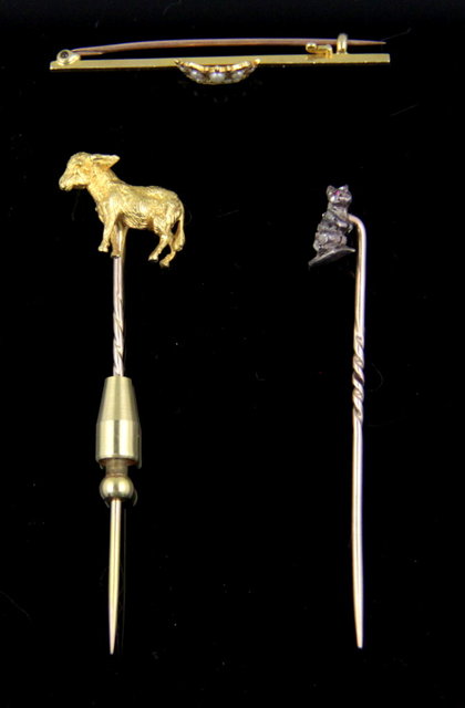 A rose diamond set pin the terminal