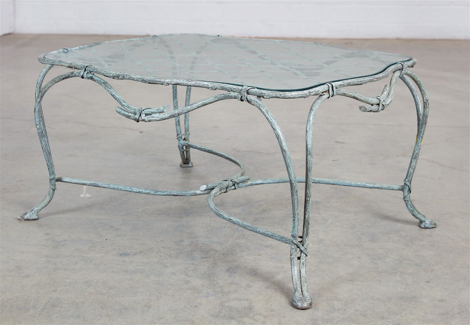 A ROSE TARLOW PATINATED IRON TWIG