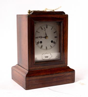 A rosewood cased mantel clock,