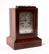 A rosewood cased mantel clock,