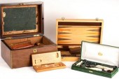 A rosewood humidor containing