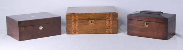 A rosewood tea caddy 23cm (9") high