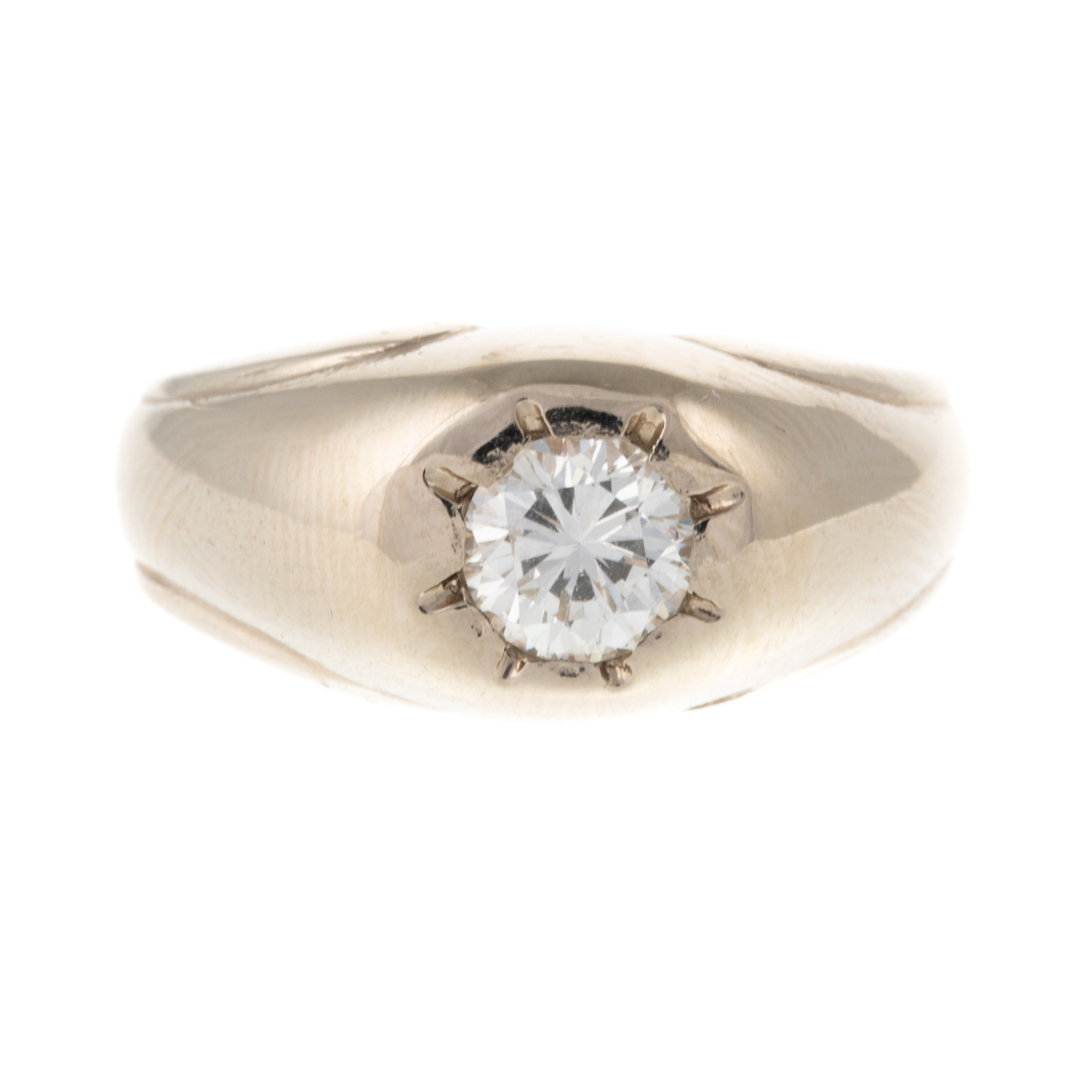 A ROUND DIAMOND GYPSY SET RING IN
