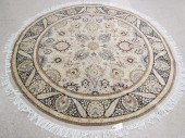 A ROUND ORIENTAL AREA RUG, IND