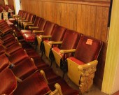 A ROW OF TWELVE VINTAGE THEATE