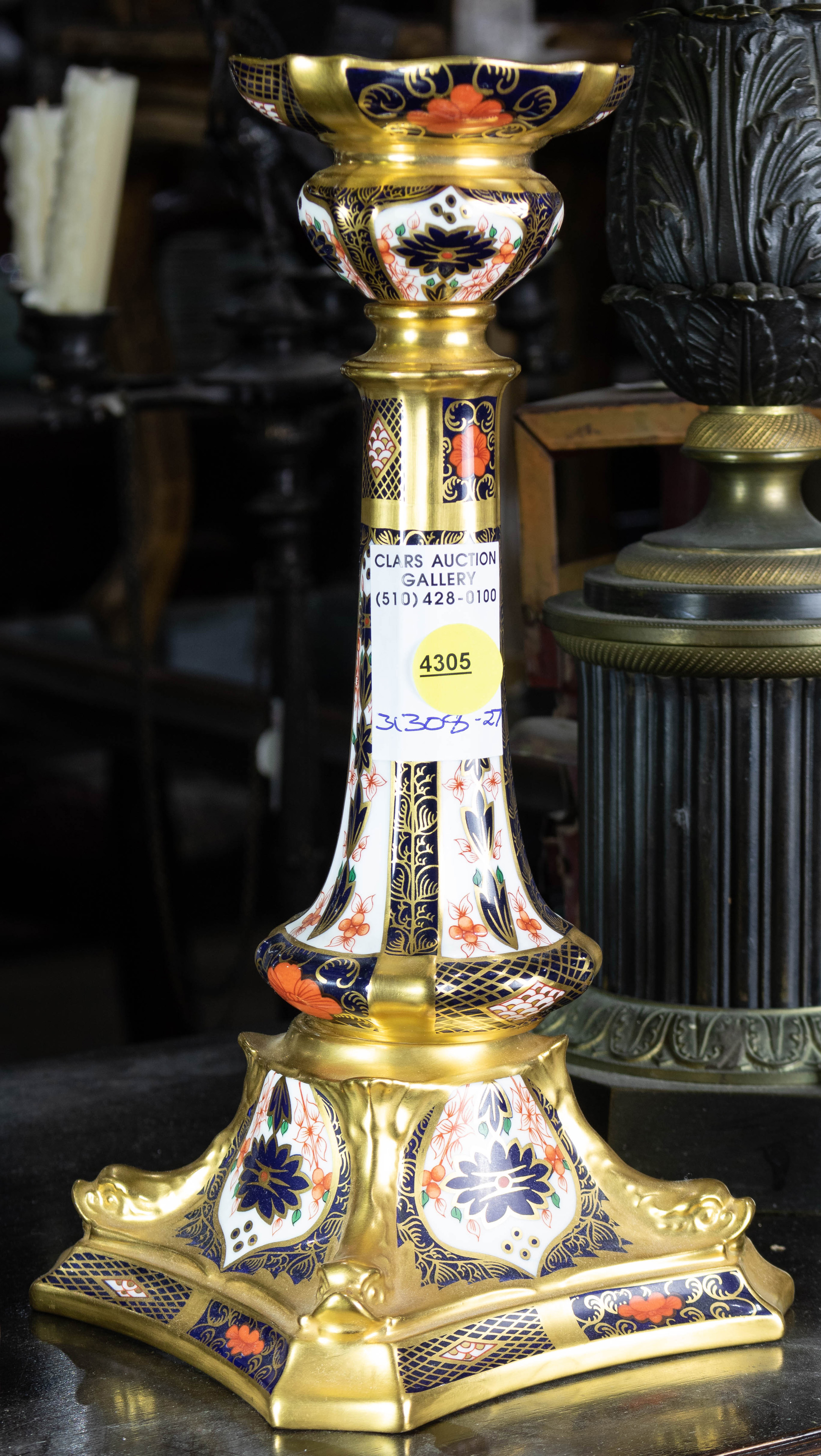 A ROYAL CROWN DERBY CANDLESTICK A