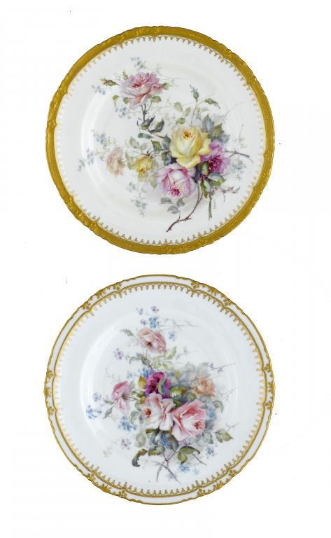 A ROYAL CROWN DERBY PLATE of