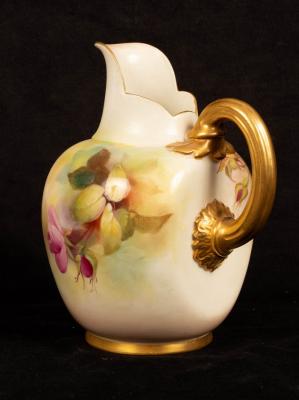A Royal Worcester blush ivory jug