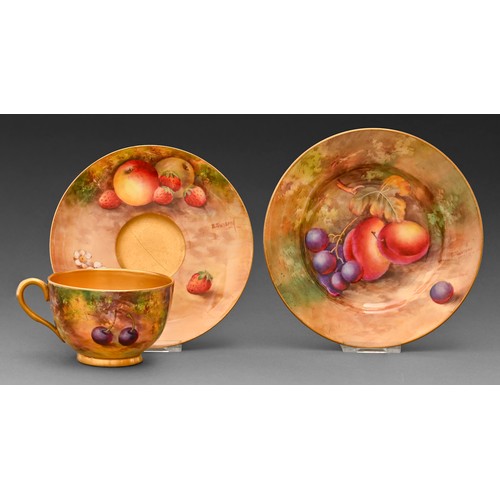 A Royal Worcester teacup, saucer