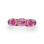 A RUBELLITE AND EIGHTEEN KARAT