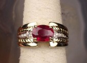 A RUBY AND DIAMOND RINGA RUBY