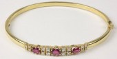 A ruby and diamond set 18ct ye