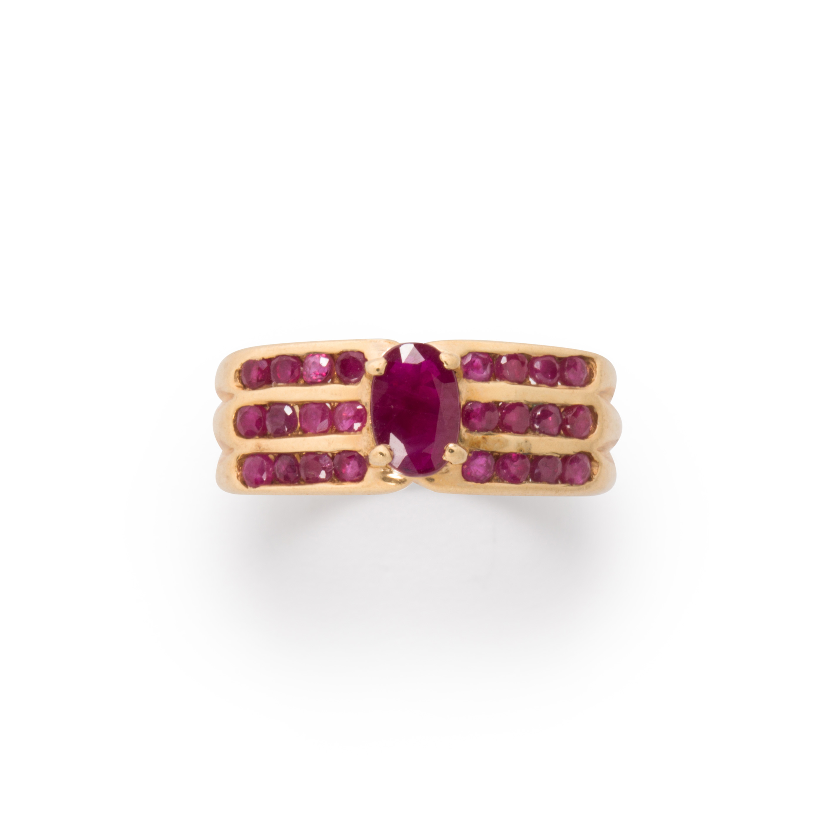 A RUBY AND TEN KARAT GOLD RING A